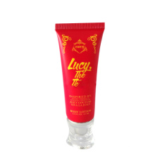 tube de nettoyant pour le visage en plastique rouge pe avec bouchon acrylique